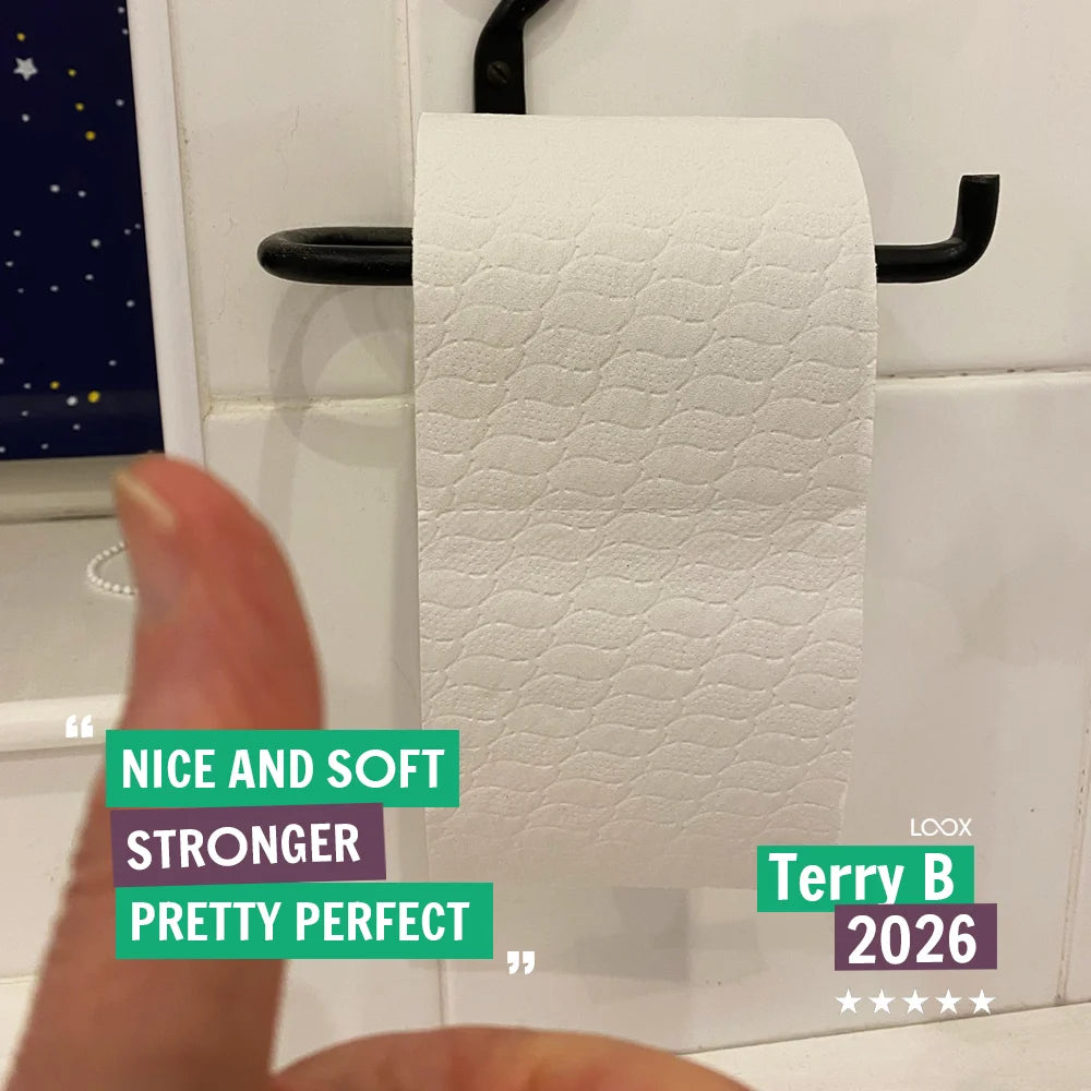 Customer review photo from Terry B: Serious Tissues toilet roll on a holder, 5-star rating – Nice and Soft, Stronger, Pretty Perfect